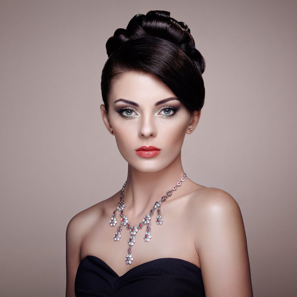 fashion portrait of young beautiful woman with jewelry 1